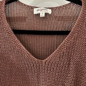 Elegant twist front sweater.